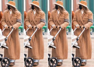 Джиджи Хадид в пальто цвета кэмел и шляпе Louis Vui... - glamour.ru