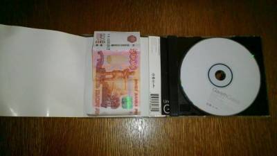 Держатель для CD-дисков - незаменимое хранилище денежных средств - lifehelper.one