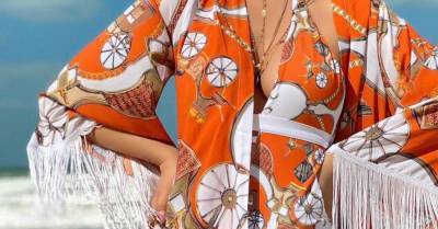 Мария Погребняк - Павел Погребняк - Очки с цепочкой и апельсиновый купальник: Мария Погребняк показала пляжный образ - wmj.ru - Эмираты