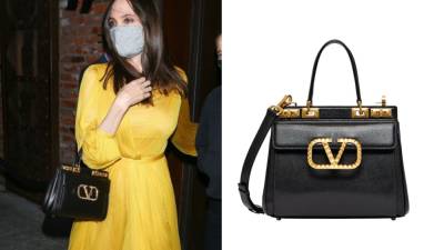 Анджелина Джоли - Valentino - Образ дня: Анджелина Джоли с новой сумкой Valentino - vogue.ua