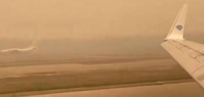 Нет - это не Марс: на видео попала посадка самолёта в аэропорту "Мирный" - porosenka.net - республика Саха - Якутск
