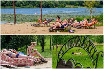 «Жара»: минчане отдыхают на пляже, где можно загорать, но нельзя купаться - porosenka.net