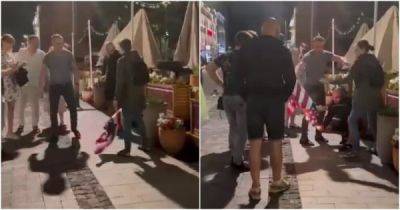В Нижнем Новгороде мужчины отобрали у прохожей американский флаг и попытались его сжечь - porosenka.net - Сша - Нижний Новгород