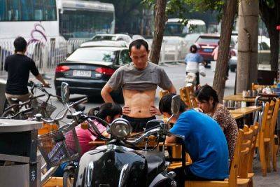 Почему китайцы любят ходить с голым животом - porosenka.net - Китай - Франция